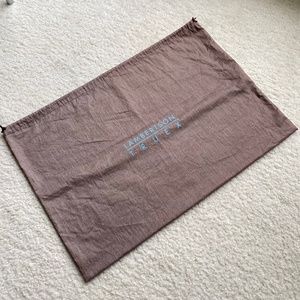 Lambertson Truex taupe colored dust bag. 20 x 13 3/4 in.